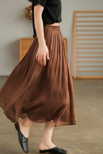 Flowing gauze skirt swaying romantic high-end cutting slimming solid color glossy texture half skirt for women