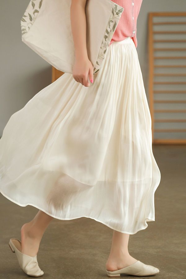 Flowing gauze skirt swaying romantic high-end cutting slimming solid color glossy texture half skirt for women